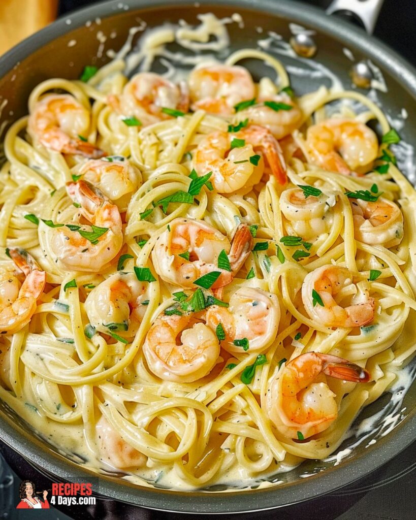 Serving Garlic Shrimp Alfredo in Four Cheese Pasta Sauce